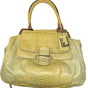 COACH LIMITED EDITION
Madison Pinnacle Lily
PYTHON Leather Handbag